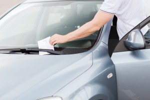 parking ticket on car windscreen